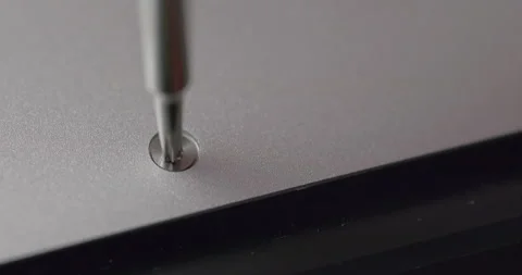 Computer specialist / technician unscrew bolt / nut - 4K Prores 422 HQ Stock-Footage 235568489