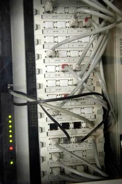 Computer switch with network cables Stock Photos