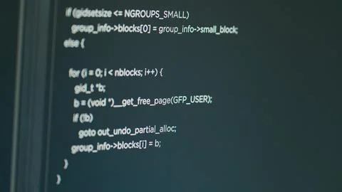 Computer of system engineer showing source code and big data Stockfoto's
