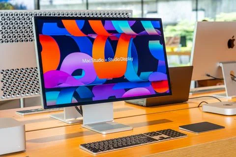 Computer system unit Mac Studio Studio Display multicolor on the store window Stock Photos