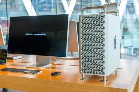 Computer system unit Mac Studio Studio Display multicolor on the store window Stock Photos