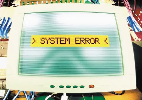 Computer "systems error" message on screen, digital composite. Stock Photos