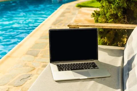 Computer on table background as a pool. Stock Photos