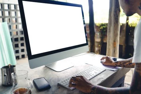 The computer on the table in the house Stock Photos