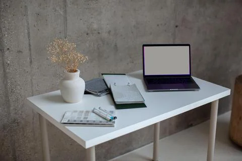 The computer is on the table. Stock Photos