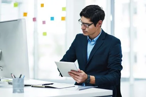 Computer, tablet and business man in office with research, insurance policy and Stock Photos