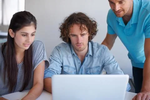 Computer, teamwork and creative people in business startup, website design ideas Stock Photos