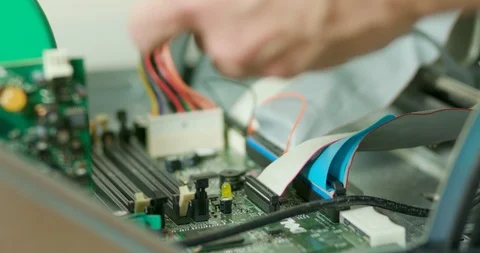 Computer tech installing RAM in a pc Stock Footage 123326804