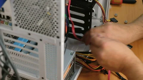 Computer technician assembles a computer. Build a home PC 스톡 동영상 99246865