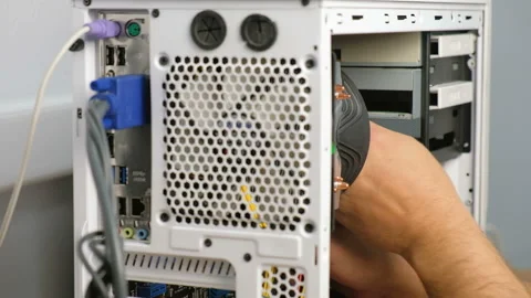 Computer technician assembles a computer. Build a home PC Stock-Footage 99247242