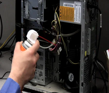 Computer Technician blows canned air into PC Video stock 38755158