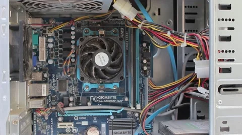 Computer Technician Blows Canned Air Into Pc. Cloud of dust Stockbeeldmateriaal 49066851