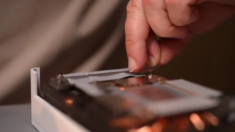 Computer technician carefully applying thermal paste to CPOU of desktop computer Stock Footage 287512211
