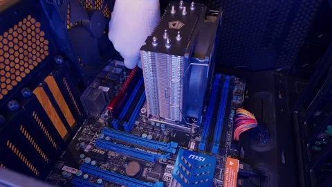 Computer technician installing RAM in PC case. Assemble computer system unit Stock Footage 275745476