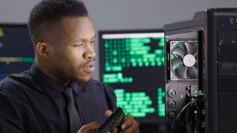 Computer technician repairing computer/server Stock Footage 71999561