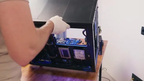 Computer technician serves system unit. Assemble computer. Minsk, Belarus - Stock Footage 276913297