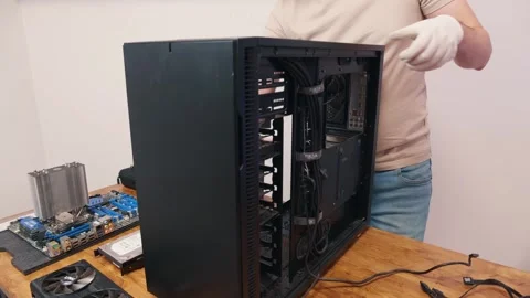 Computer technician serves system unit. Assemble computer. Minsk, Belarus - Stock Footage 277164342