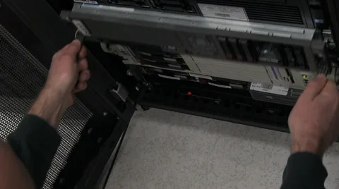 Computer technician working in server room Stock Footage 34600327