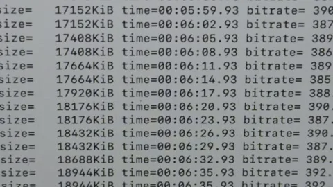 Computer Terminal Displaying Fast Moving Data Processing and Bitrate Information Stock Footage 345512309