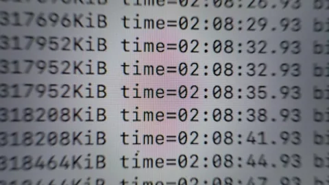 Computer Terminal Displaying Fast Moving Data and Processing Information Stock Footage 345512773