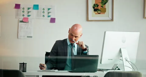 Computer, thinking and businessman writing on documents for finance report Stock Footage 313650058