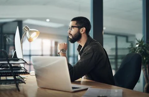 Computer, thinking and reading with business man in office for web designer, UX Stock Photos