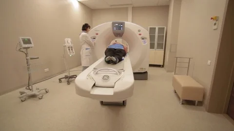 Computer tomography and patient Stock Footage 80123232