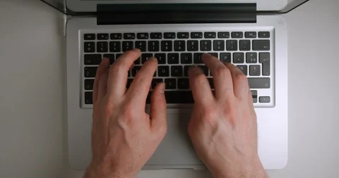 Computer typing from above 4K Stock Footage 127404708