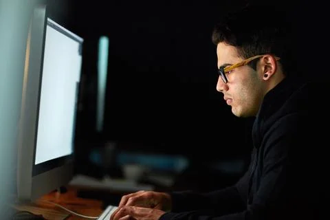 Computer, typing and man at night for software development, programming update 스톡 사진