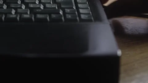Computer user ejects data storage floppy disc files from old laptop Stock Footage 311691888