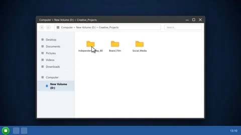 Computer user navigating file explorer to browse and preview data. 4K Stock Footage 341694004