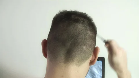 Computer user, pensively scratches his head. Stock Footage 71678921