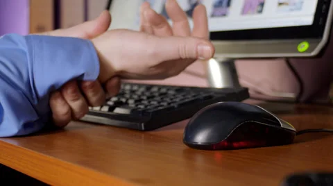 Computer user with RSI Stock Footage 34304136