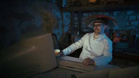 Computer User Working in Dark Office Environment Stock Footage 340483556