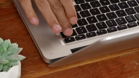 The computer user's finger, he presses the delete key on the computer keyboard. Video stock 317447276