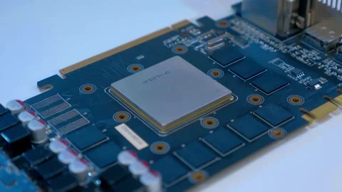 A computer video card with processor and many chips on the circuit board Stock Footage 268915707