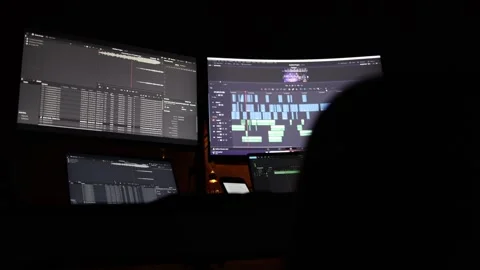 Computer with video editing software many screens symbolize professional video a Stock Footage 297112999