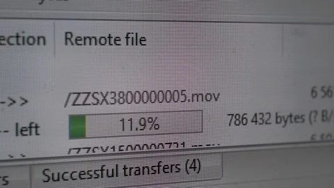 Computer on which the loading or unloading of files is displayed. Stock Footage 117170934