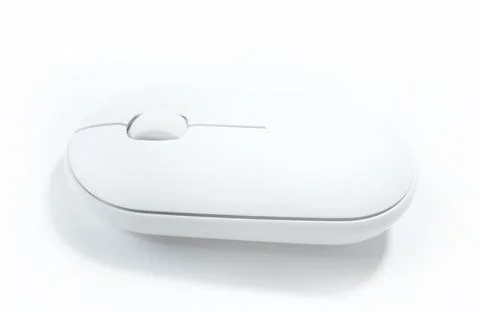 Computer white mouse in hand on a white background in banner format. Computer Stock Photos