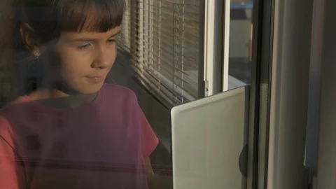With a computer by the window. Stock Footage 118427186