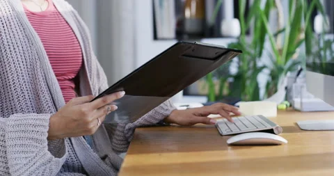 Computer, work and internet research of business woman multitask with clipboard Stock Footage 206294454