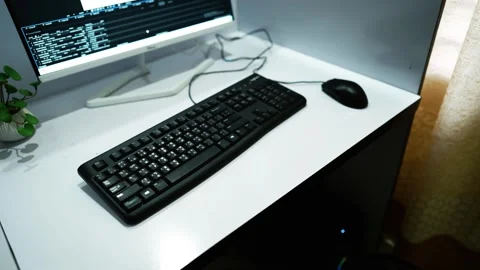 Computer Workstation with Coding Display, A computer workstation with a key.. Stock Footage 304961701