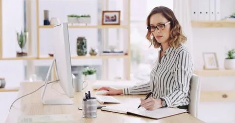 Computer, writing notes and business woman in office for research, financia.. 스톡 사진