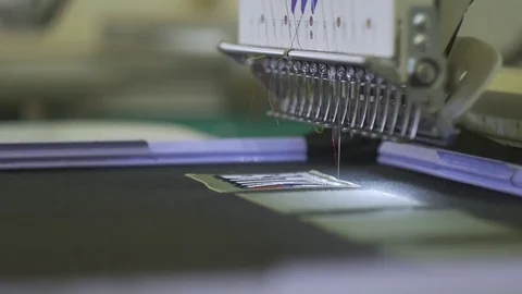 Computerized embroidery machine, women working Video stock 78382595