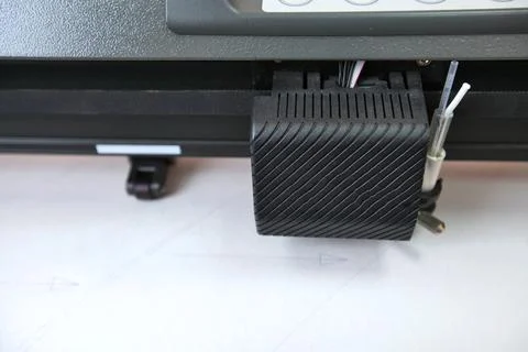 Computerized robot for automatic writing with a pen. Sewing shop. Material ma Stock Photos