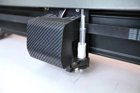 Computerized robot for automatic writing with a pen. Sewing shop. Material ma 스톡 사진