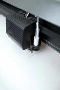 Computerized robot for automatic writing with a pen. Sewing shop. Material ma Stock Photos