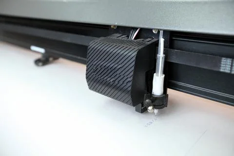 Computerized robot for automatic writing with a pen. Sewing shop. Material ma 스톡 사진