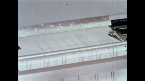 Computers assist in calculations and applied mathematics in 1961 and comes from Stock Footage 84724461