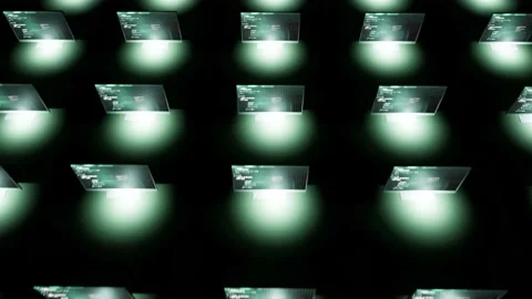 Computers in a crowd behind self light infinity programming code working Stock Footage 229251710